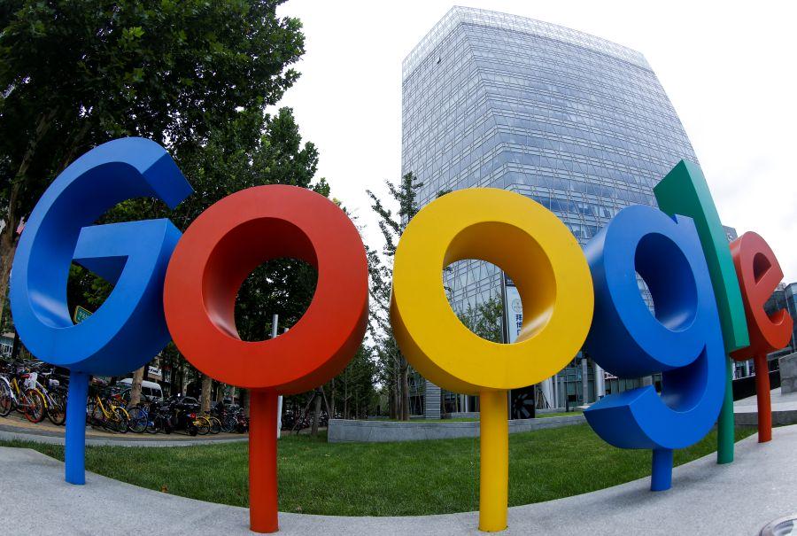 The brand logo of Alphabet Inc’s Google is seen outside its office in Beijing