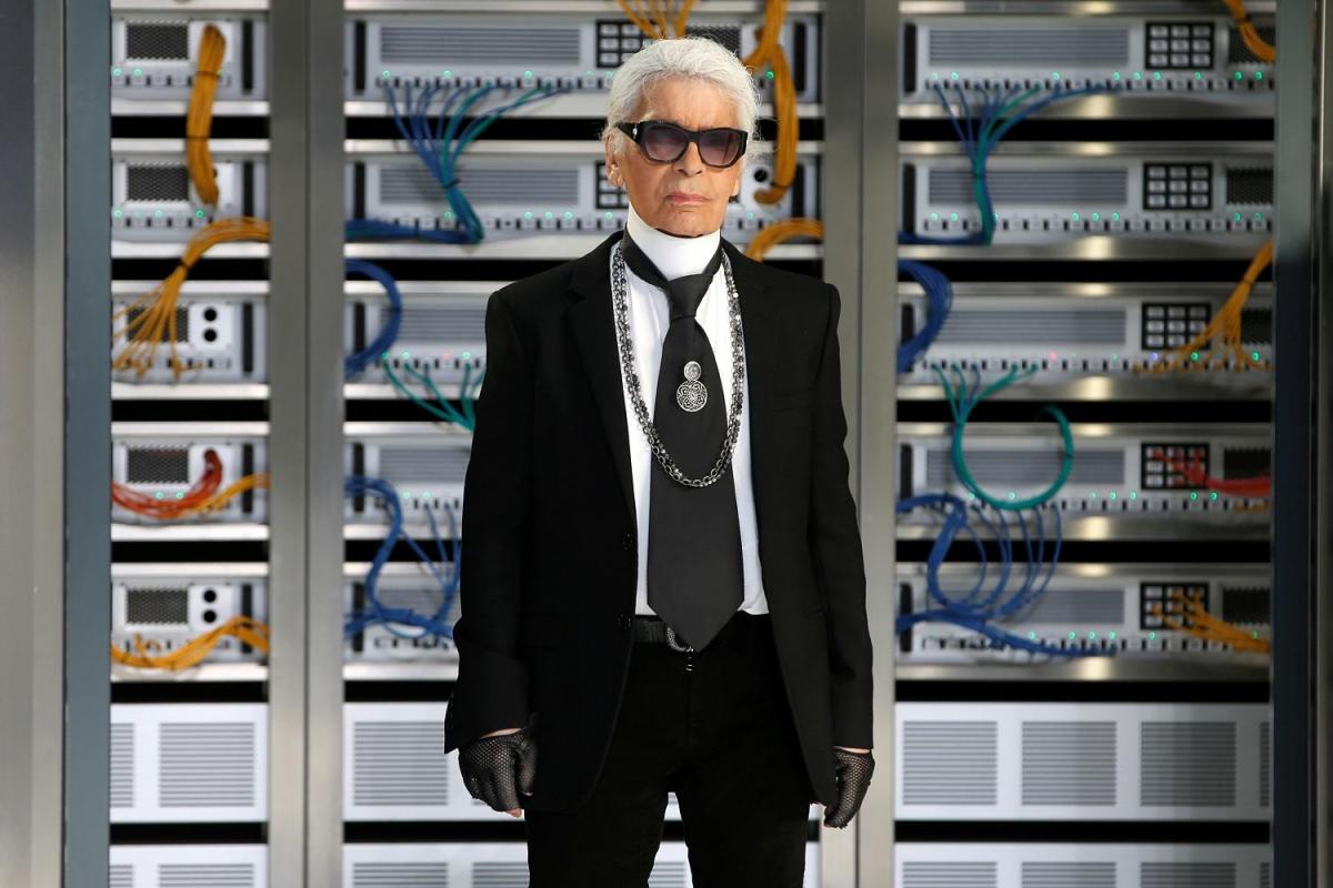German designer Karl Lagerfeld appears at the end of his Spring/Summer 2017 women’s ready-to-wear collection for fashion house Chanel during Fashion Week in Paris