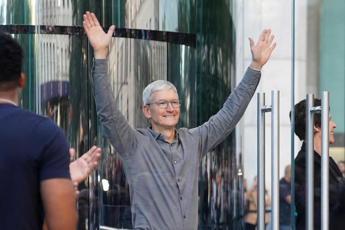 Apple CEO Tim Cook greets fans outside the Apple Store on Fifth Ave in the Manhattan borough of New York